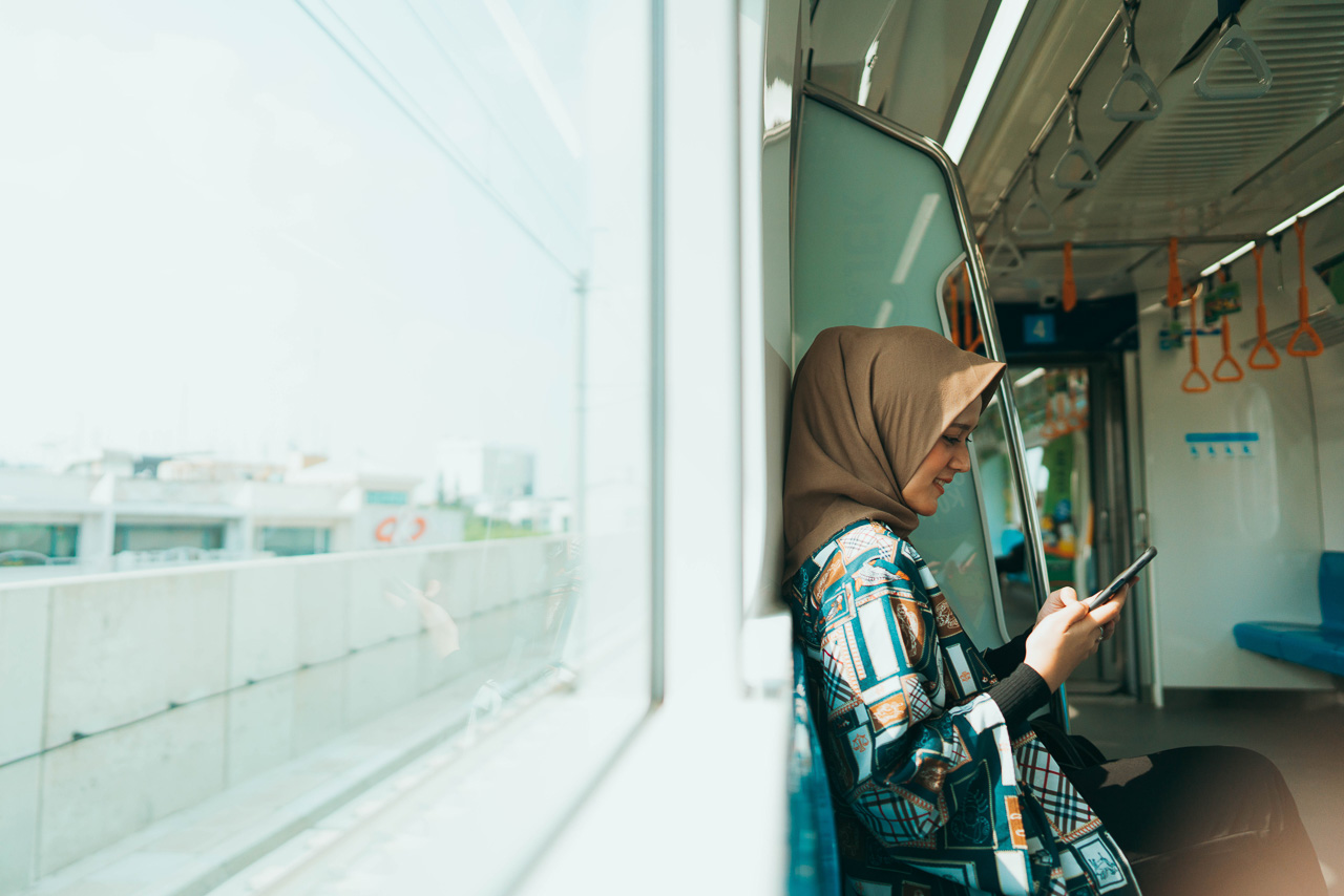 candid photo of a woman in a train