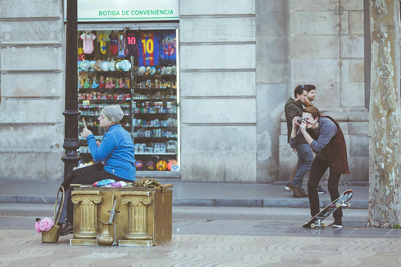 photographer capturing a candid image on the street