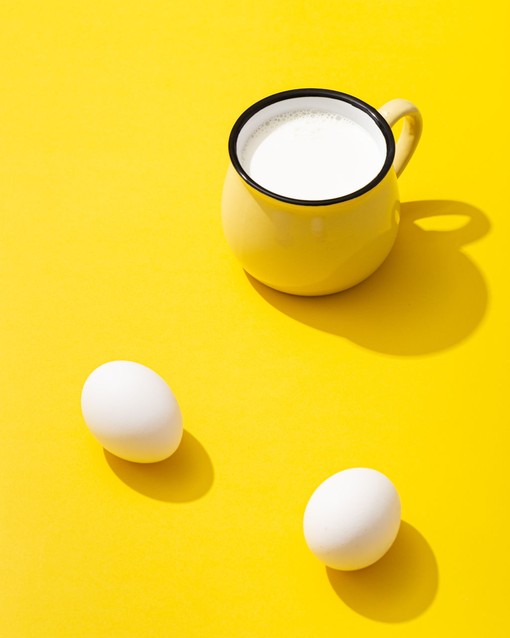 still life photo with vibrant yellow background