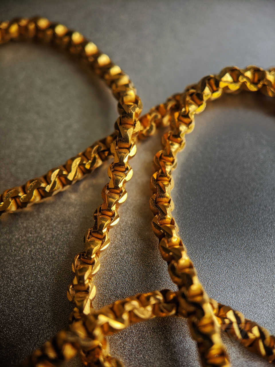 macro image of a gold chain