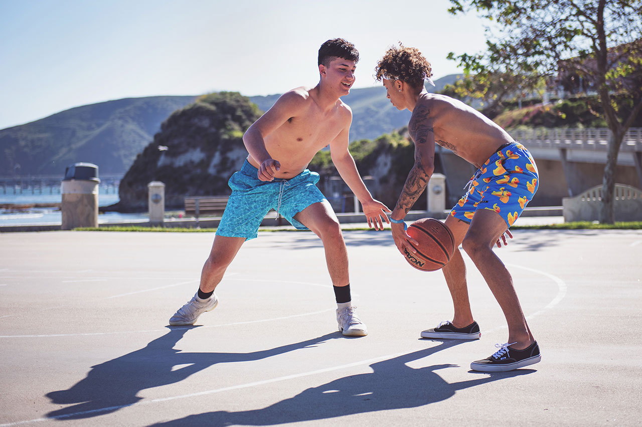 two best friends playing basketball