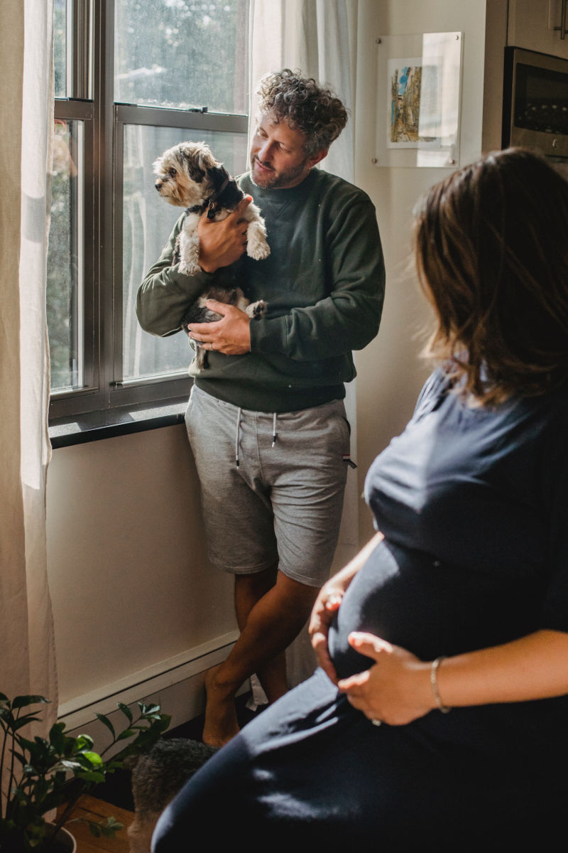 couple maternity shot with pet