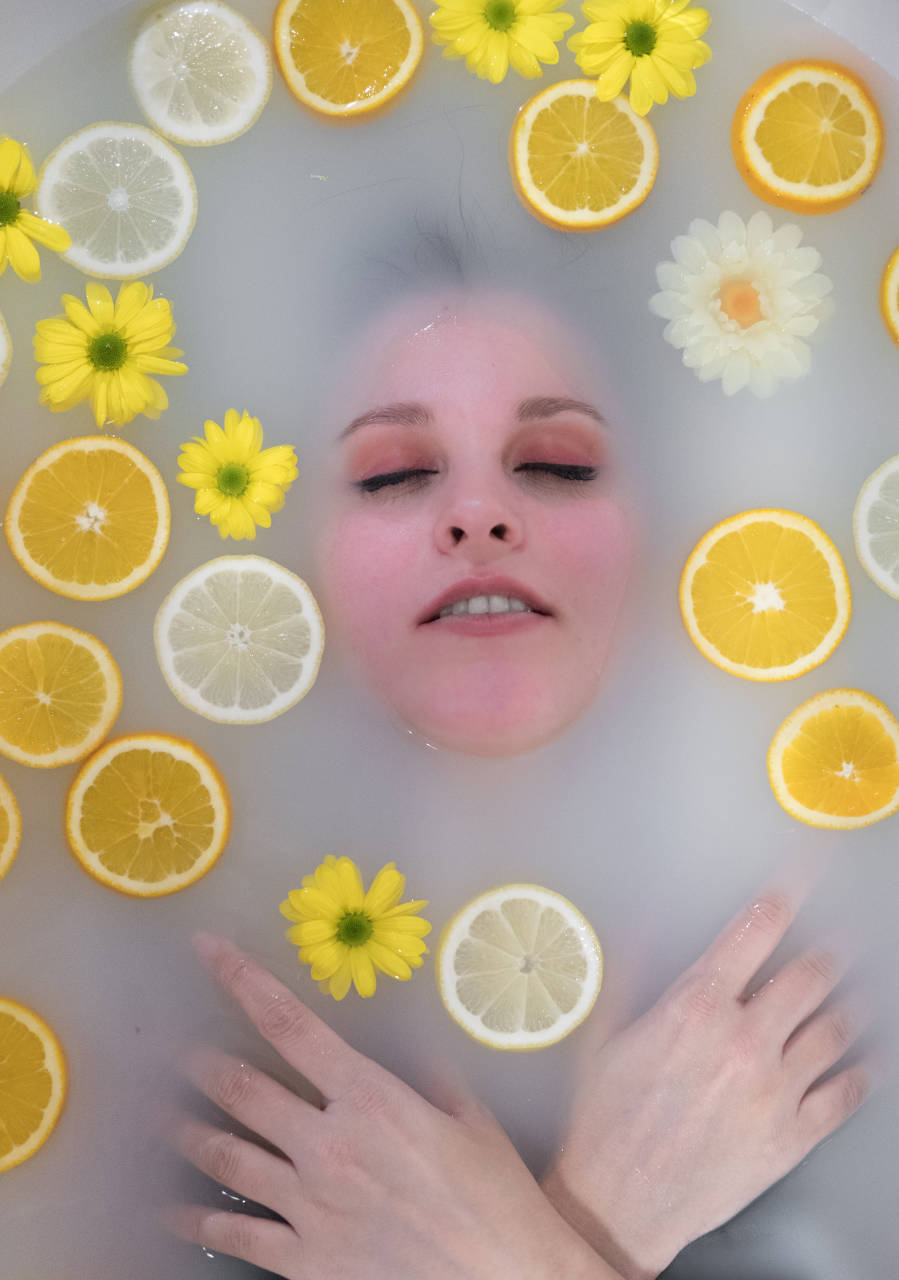 frame of fruits and flowers in milk bath photography